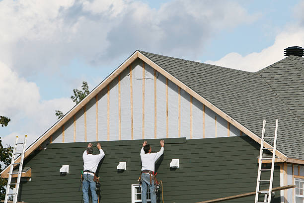 Professional Siding Installation technician working in Branchville, VA